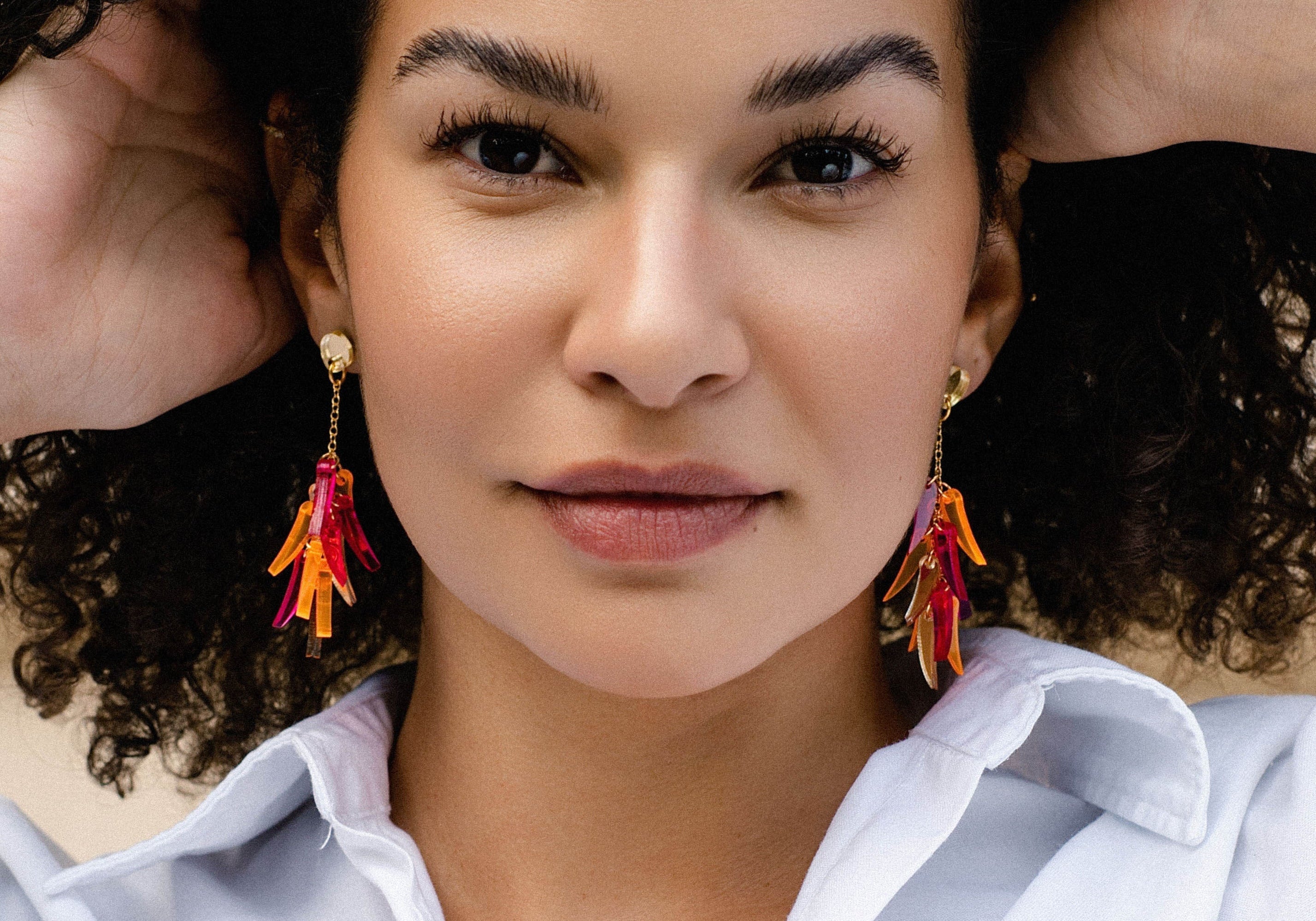 The Ultimate Guide to Statement Earrings: Definition, Styles, Styling Tips & History