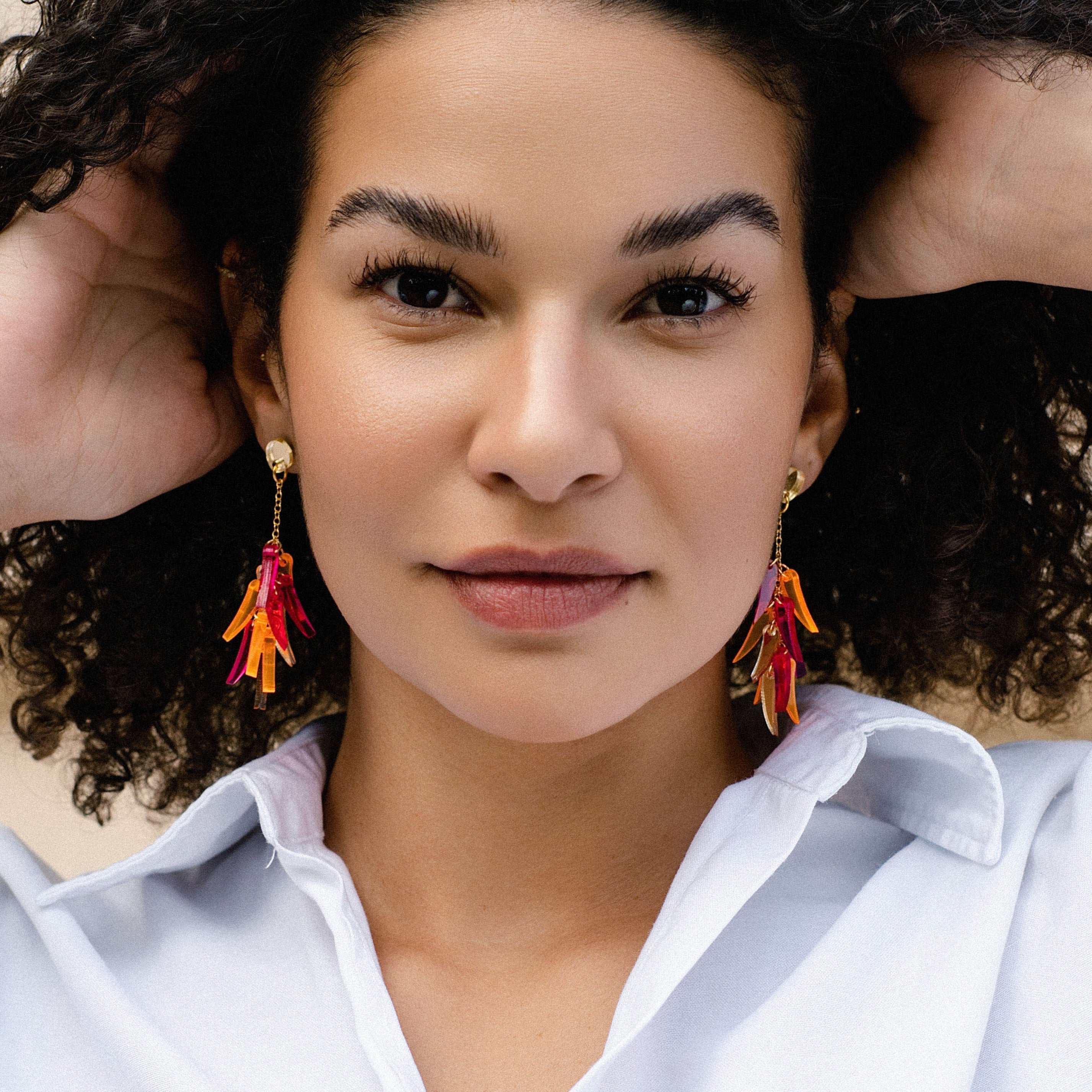 The Ultimate Guide to Statement Earrings: Definition, Styles, Styling Tips & History